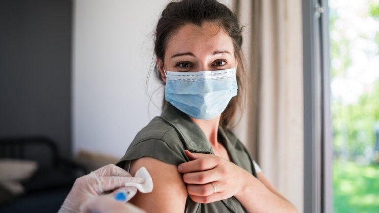 Coronavirus vaccines cut risk of long Covid, study finds