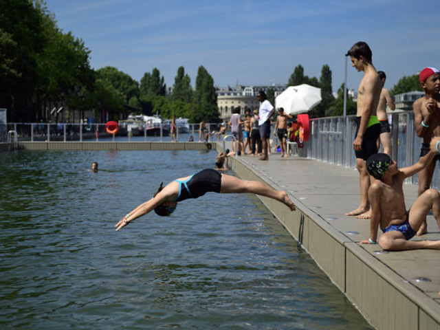 Paris Reclaims Its Iconic River Seine: A Historic Clean-Up Sets the Stage for Olympic Swimmers
